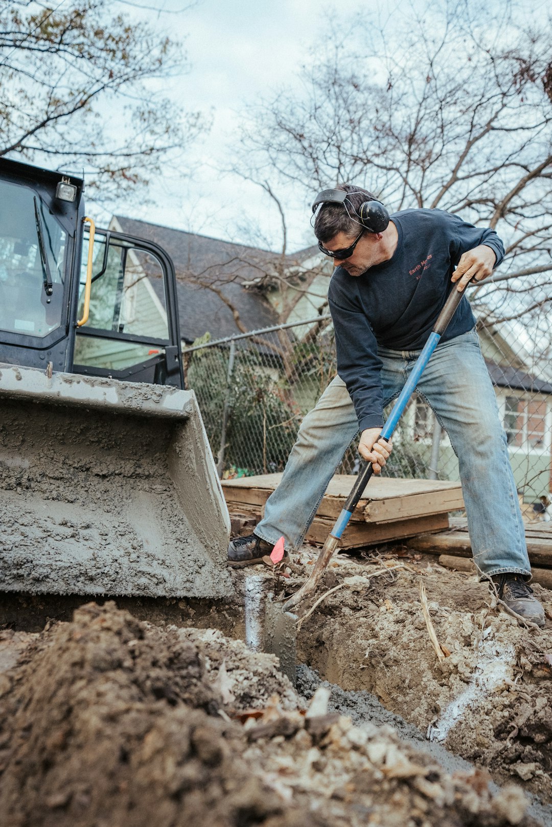 our-services-03 a-man-digging-in-the-dirt-x31buaqe-wi